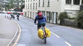 Riding through Cheddar at the lower reaches of Cheddar Gorge